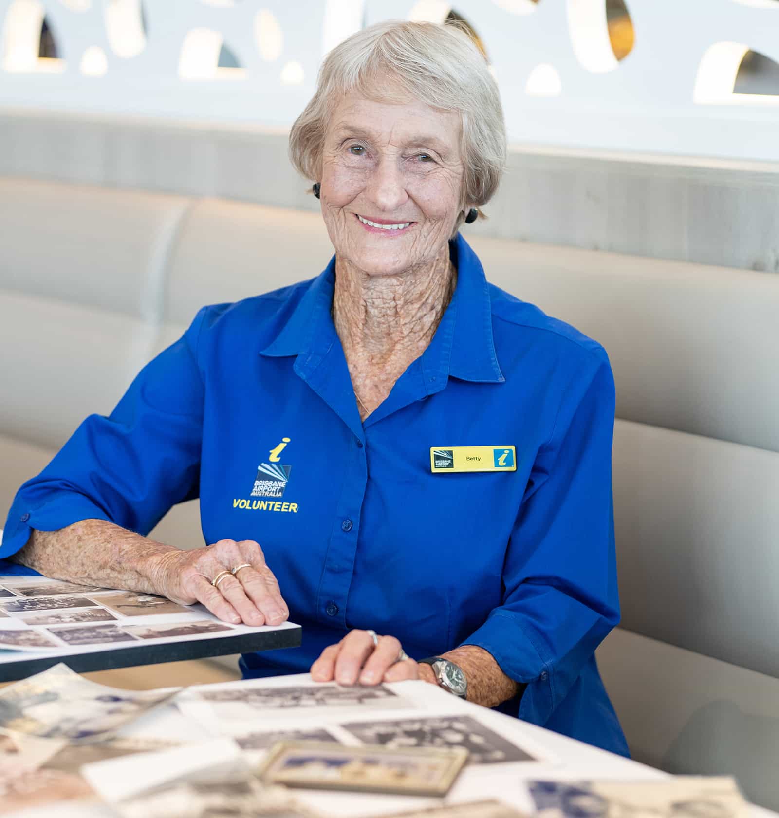 Former Cribb Island resident Betty Conway is a volunteer ambassador at Brisbane Airport | Lost Island Remembered