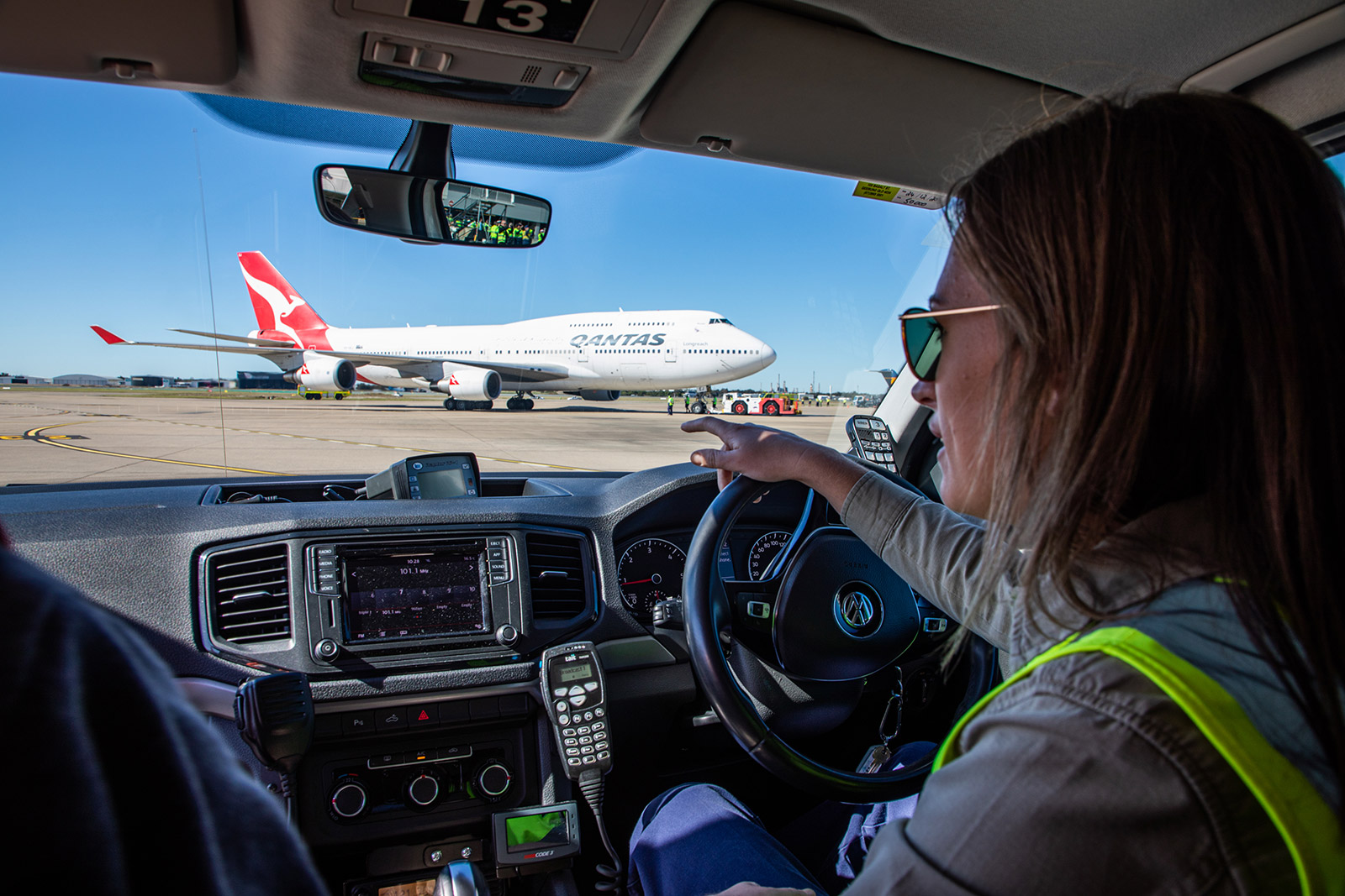 Airside Operations Officer Maria Norman with a watchful eye on the 747