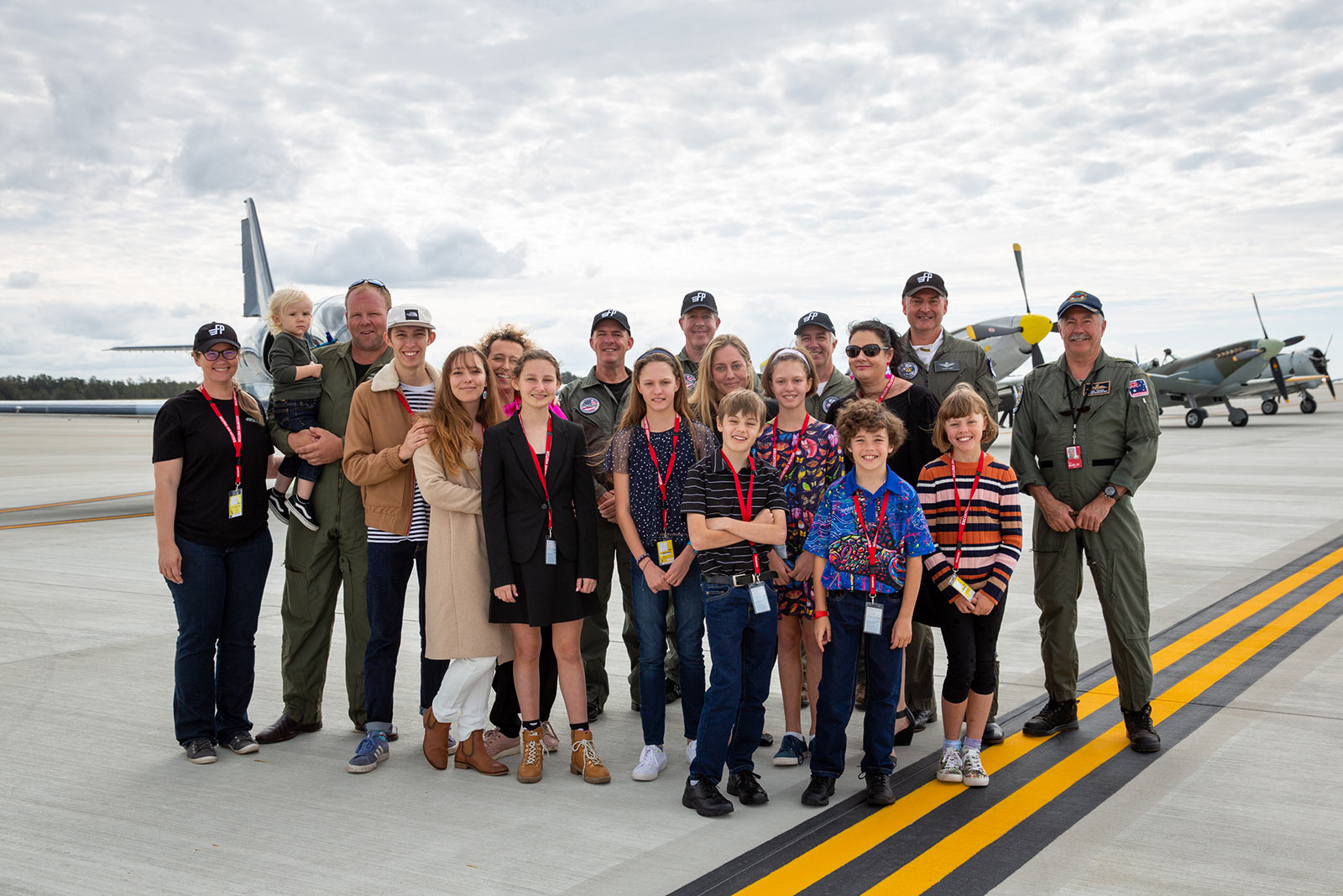 The team from Fighter Pilot Adventure Flights and their families