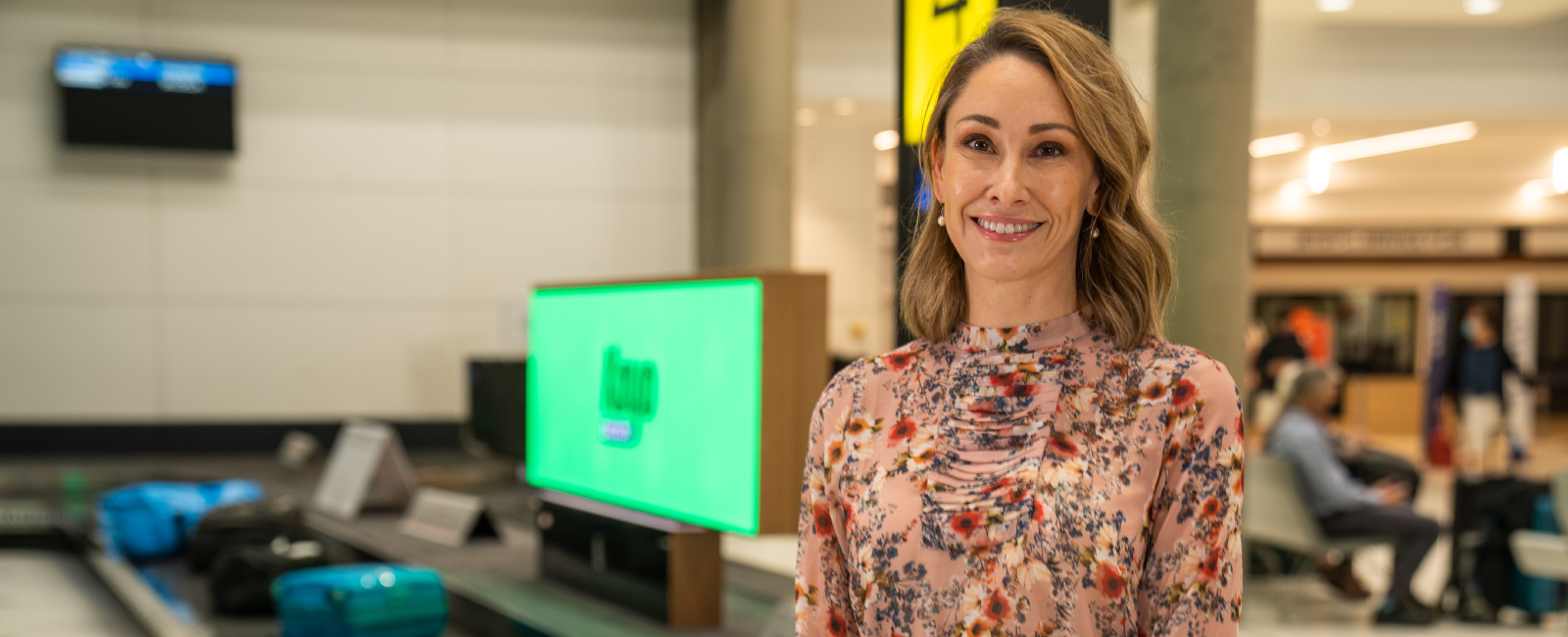 Heidi Stone at the domestic terminal baggage carousel