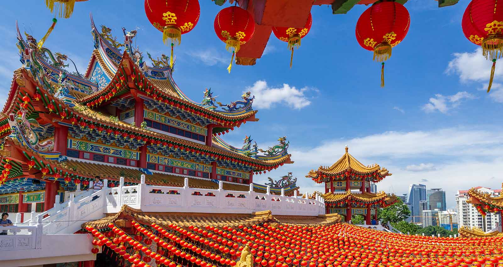 An Asian temple decorated with hundreds of red lanterns 