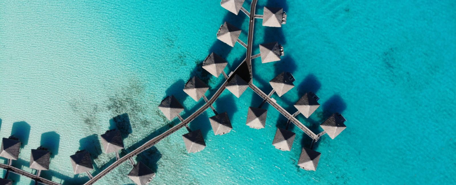 Aerial view of overwater bungalows in Bora Bora, French Polynesia