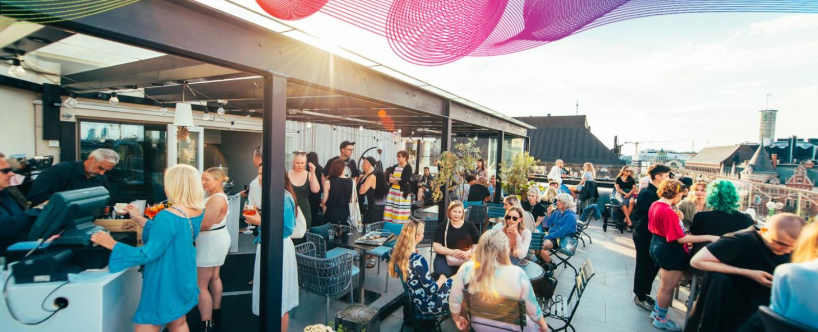 People ordering drinks at Sky Terrace Helsinki