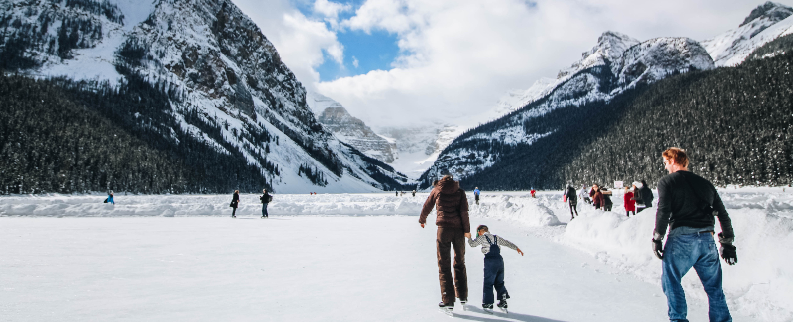 People ice skating in the Canadian Rockies, Canada