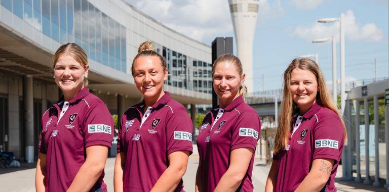 Queensland Fire players at Brisbane Airport