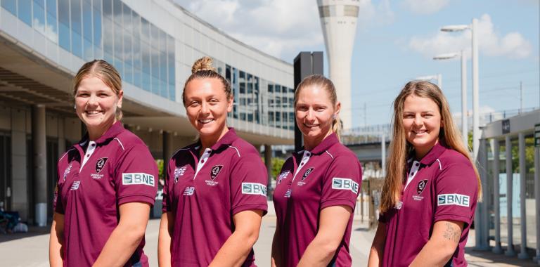 Queensland Fire players at Brisbane Airport