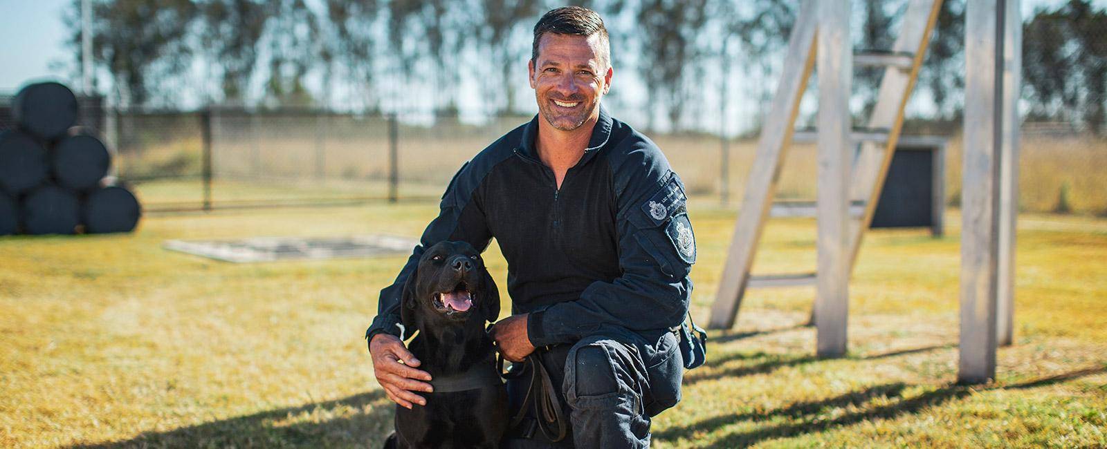 Senior Constable Scott Lewis and Firearms and Explosives Detector Dog Naya make a great team