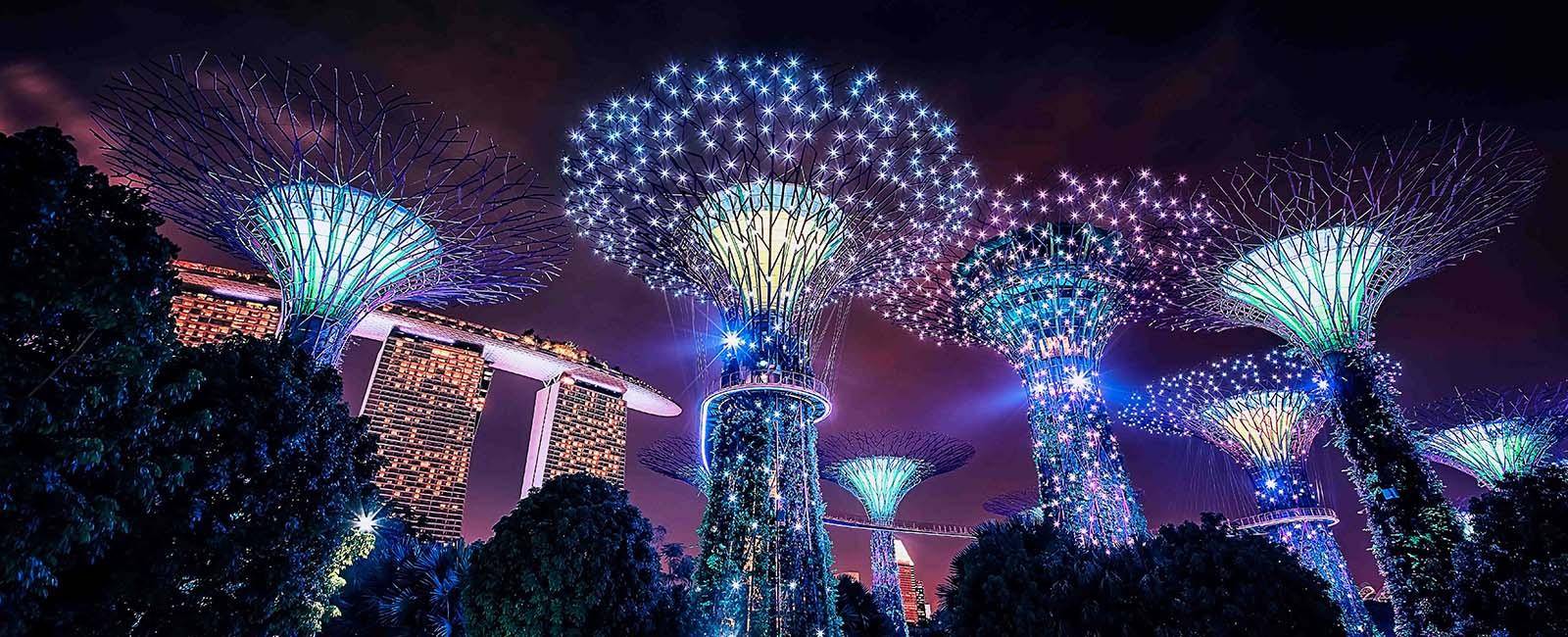 View of Singapore at night - Gardens by the Bay and Marina Bay Sands