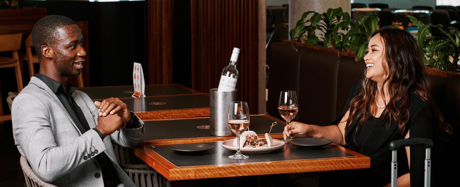 Couple dining at Brisbane Airport Domestic Terminal