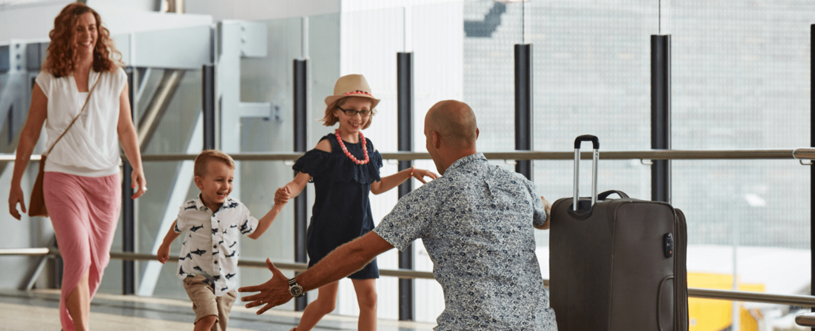 Family celebrating at the airport