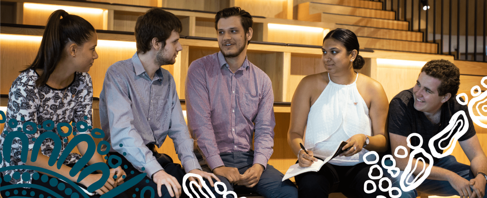 CareerTrackers interns sitting in theatre