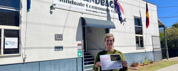 SANDBAG's Erin Williams standing in front of the Sandgate Community Centre