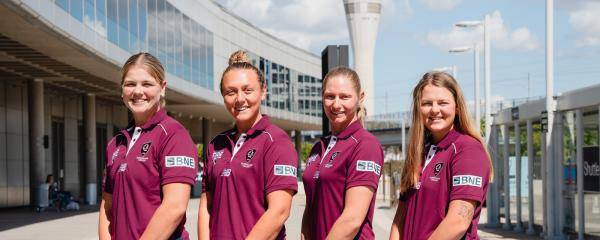 Queensland Fire players at Brisbane Airport
