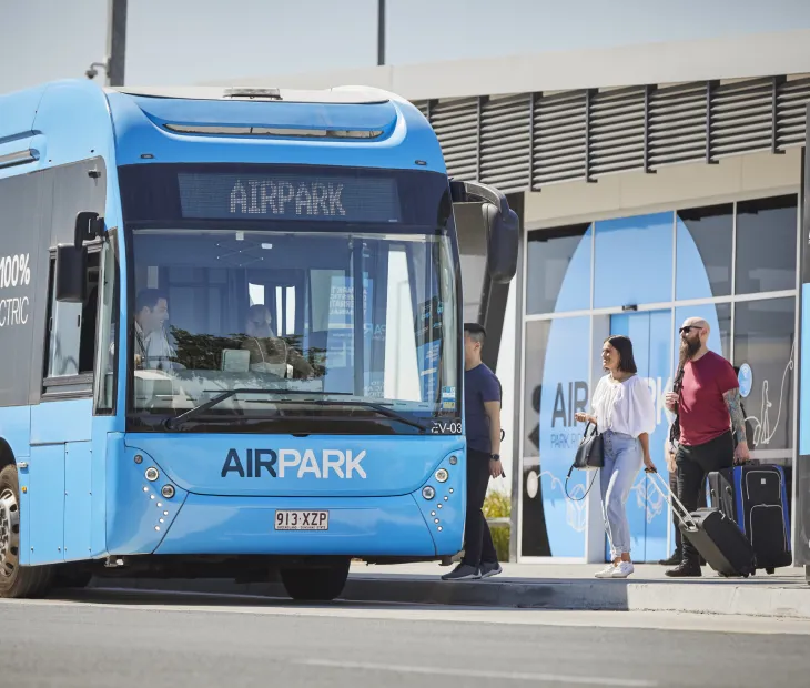 Bus collecting passengers from Airpark