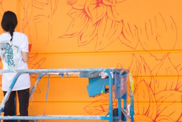 Aurora Campbell painting mural Tangerine Trip