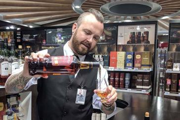 Shane Batchler, whisky specialist at Lotte Duty Free’s tasting bar, Brisbane Airport