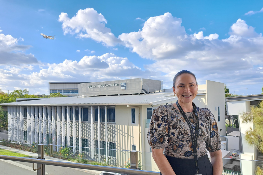 Lauren Kelly standing in front of the BAC head quarters