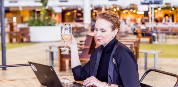 Person using BNE Wi-Fi at the International Terminal