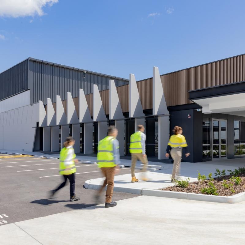 Team walking into building - Brisbane Airport Team walking into building - Brisbane Airport